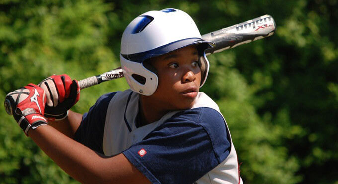 young baseball player with a bat